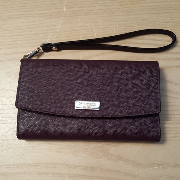 kate spade Handbags - Kate Spade Wallet Wristlet iPhone plum